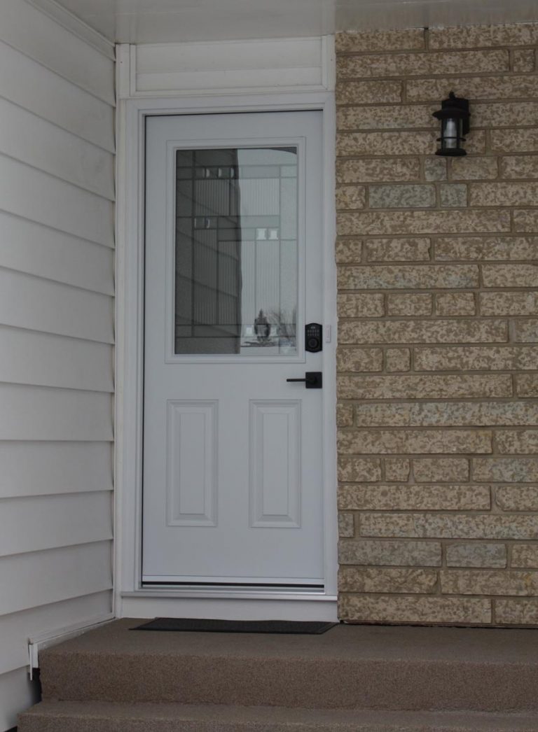 white door with decorative window